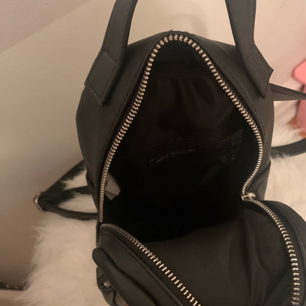 A small black backpack